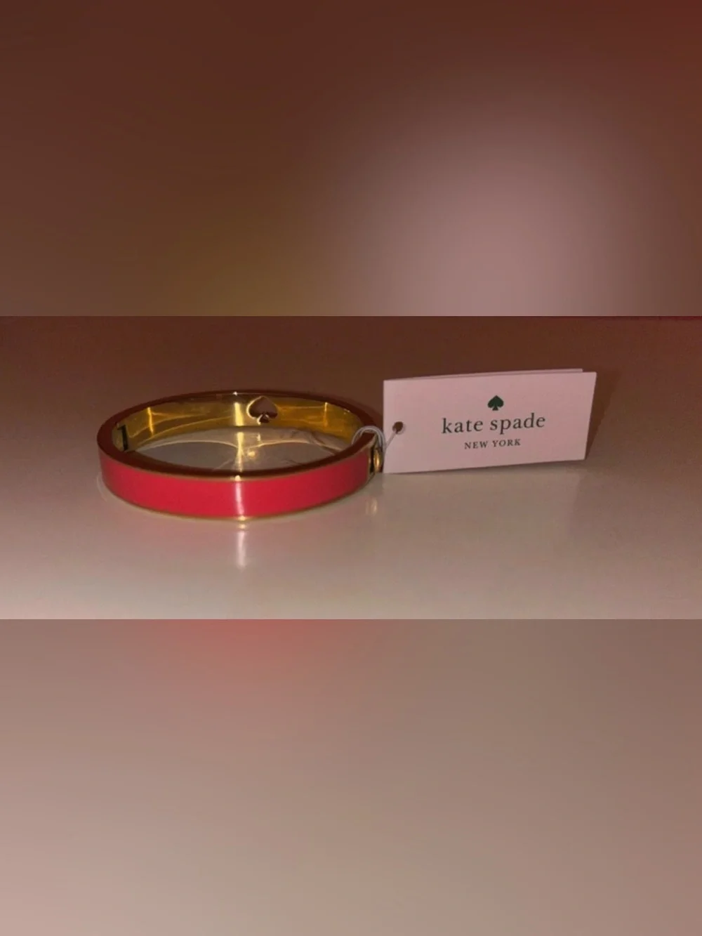 Kate Spade Gold-Tone Bangle with Coral-Pink Enamel
